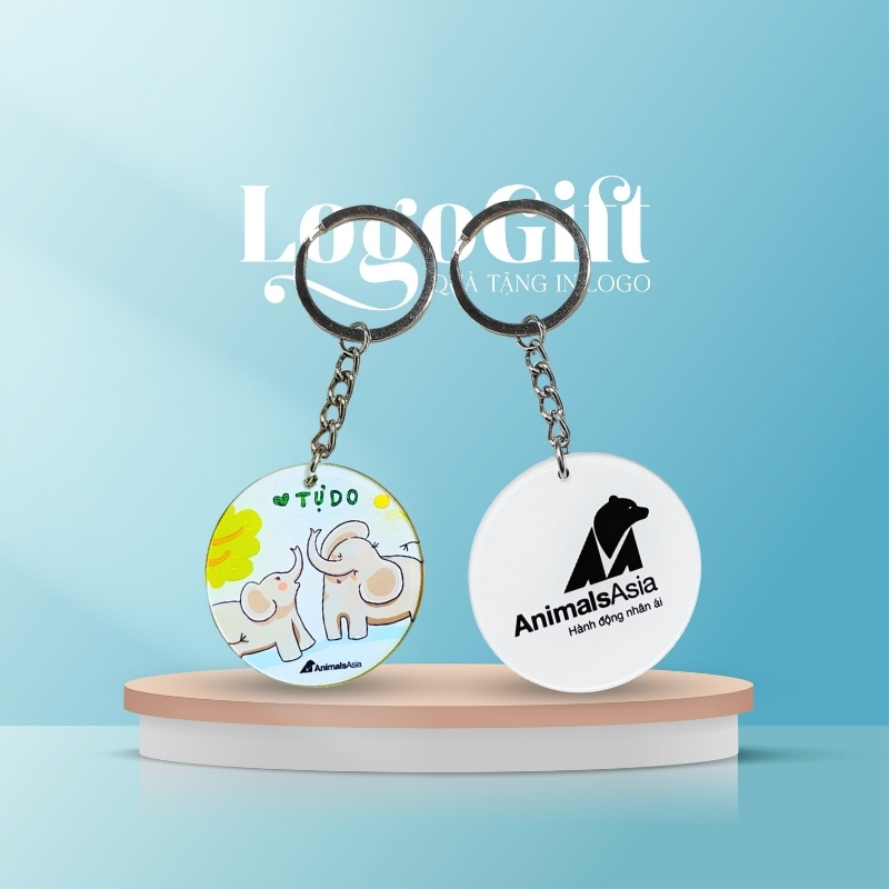 moc-khoa-qua-tang-in-logo-nhua-cung-dang-tron-4x4cm-lg-mk02 (1)