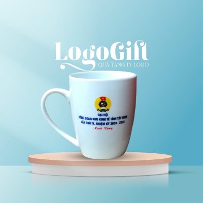 Cốc sứ in logo quà tặng Đại Hội dáng thóp quai bán tim 300ml LG-CS07