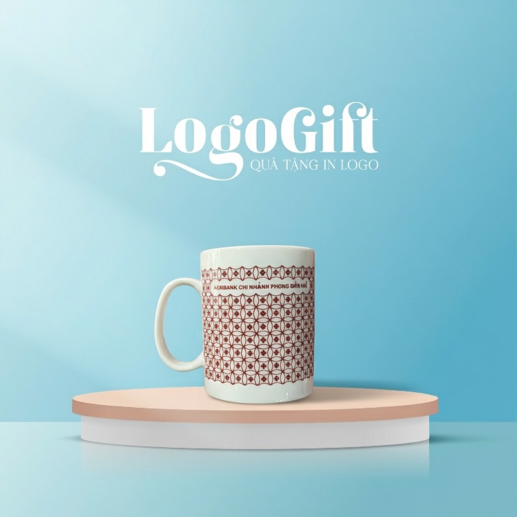 Cốc sứ quà tặng in logo dáng trụ quai C hoa lưới đỏ LG-CS19